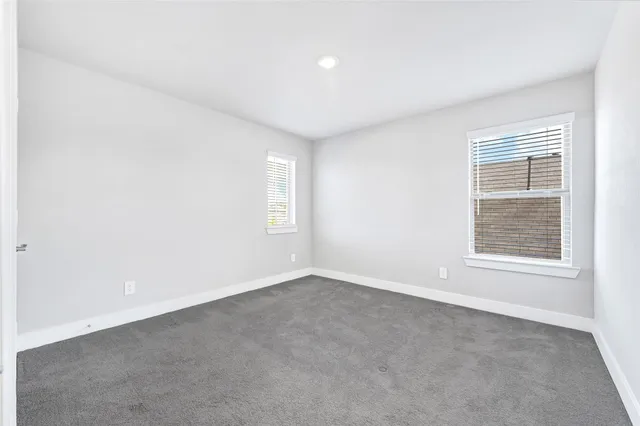 a bathroom with a tub and a shower