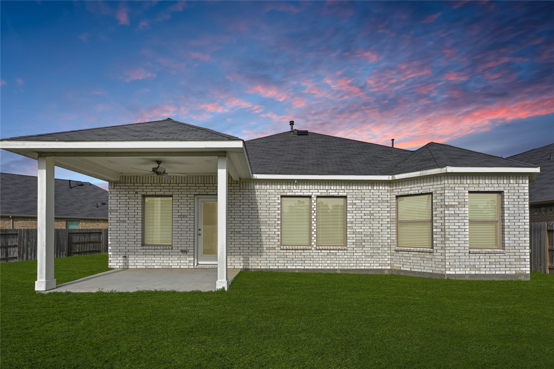 10329 South Goshawk Trail Conroe, TX 77385 - Photo 37 of 46 a front view of a house with a garden