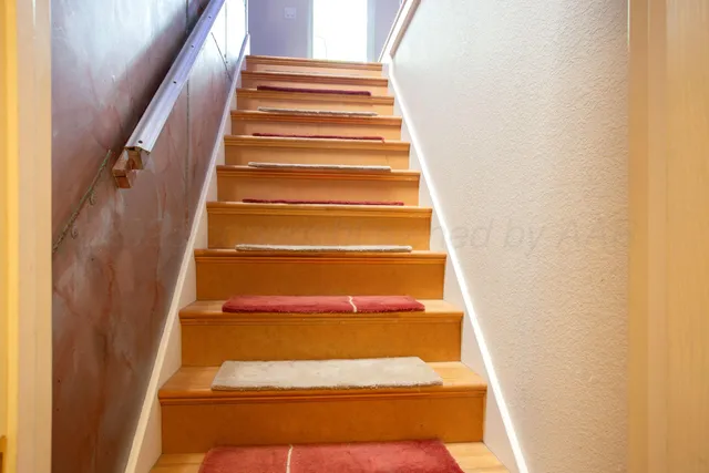 a workspace with furniture and a window