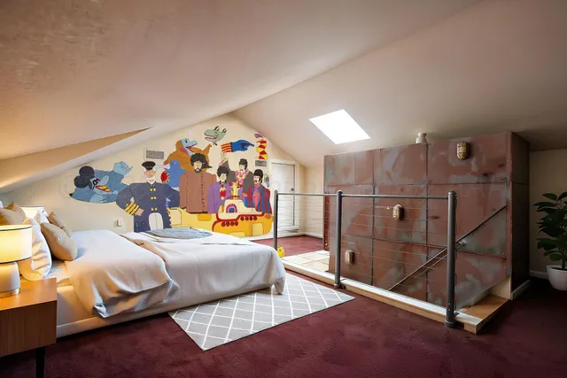 a view of backyard of house with green space and trees