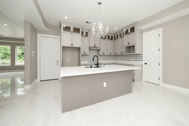 a bathroom with a sink double vanity and a mirror