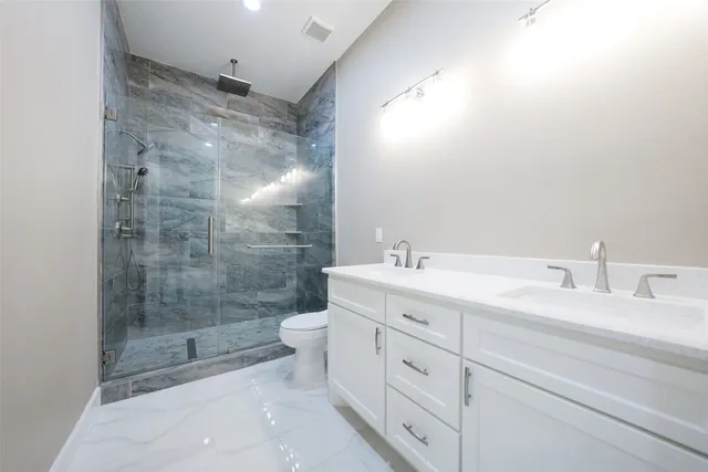 a view of a park with large trees