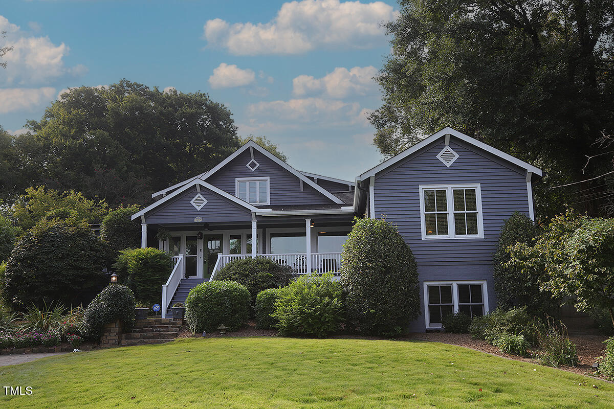 3409 White Oak Road Raleigh, NC 27609 - Photo 1 of 24 a front view of a house with a yard