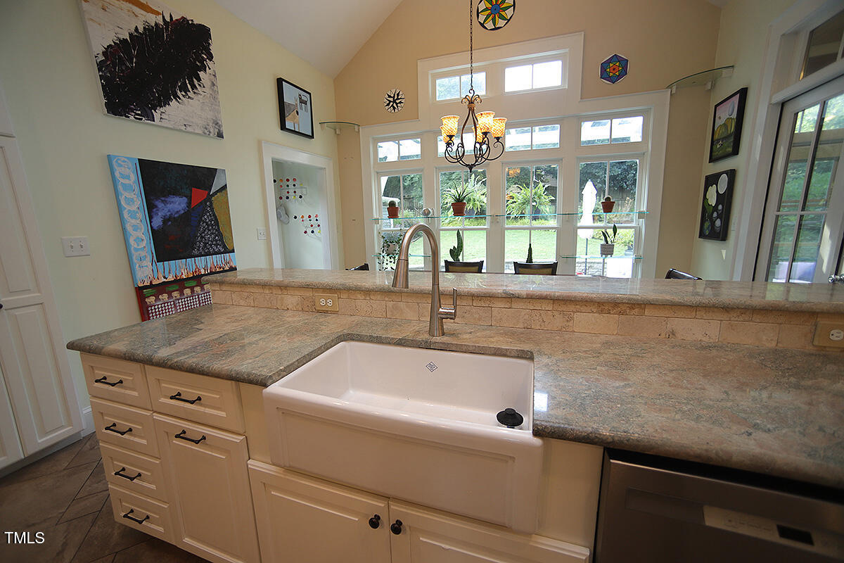 3409 White Oak Road Raleigh, NC 27609 - Photo 10 of 24 a bathroom with a sink and a mirror
