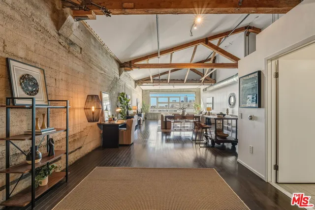 a view of a patio with table and chairs a barbeque with wooden fence