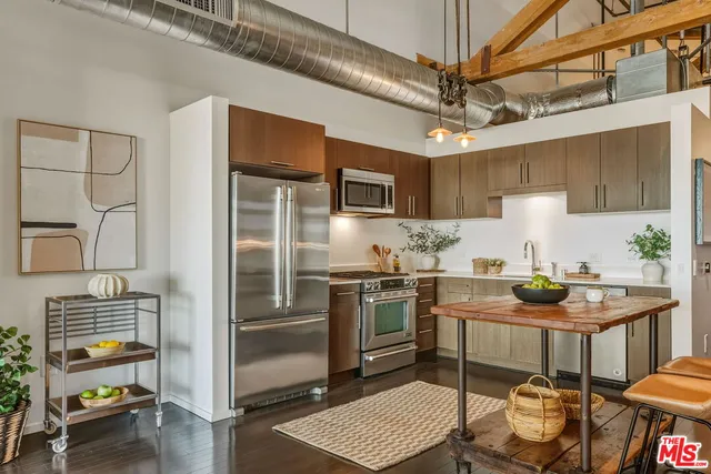 a view of a swimming pool with chairs