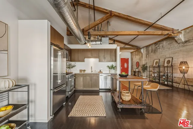 a view of a swimming pool with outdoor seating