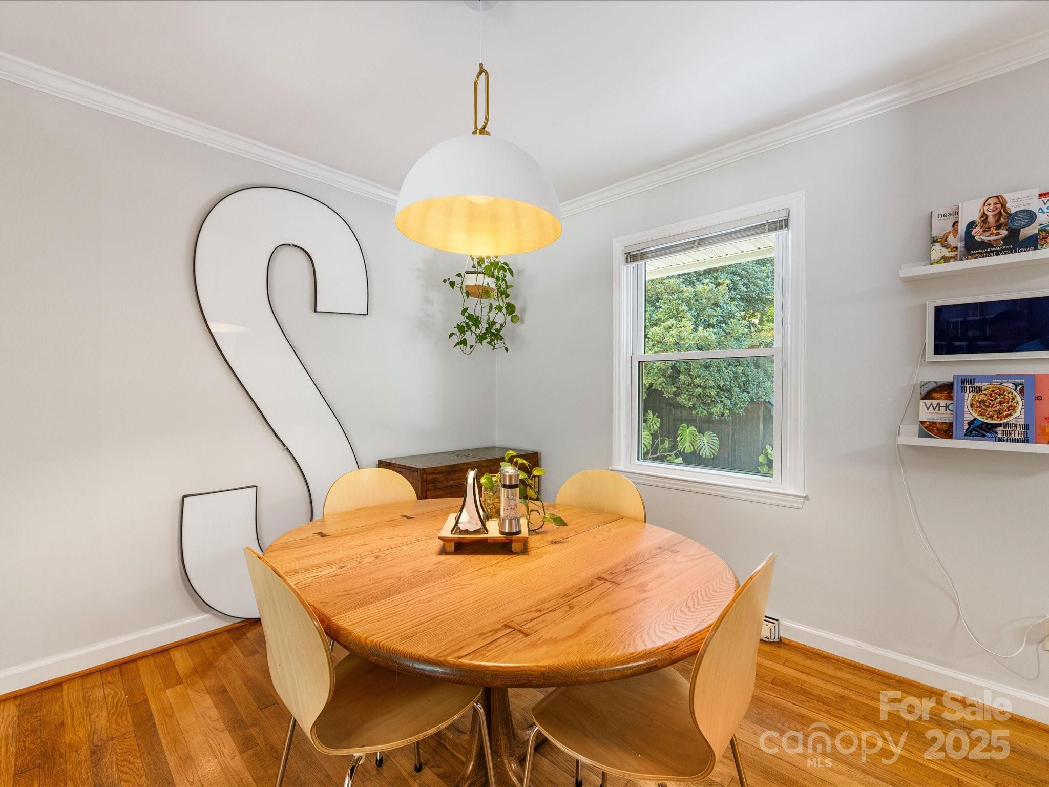 3200 Spring Valley Road Charlotte, NC 28210 - Photo 12 of 45 a dining room with furniture and a window