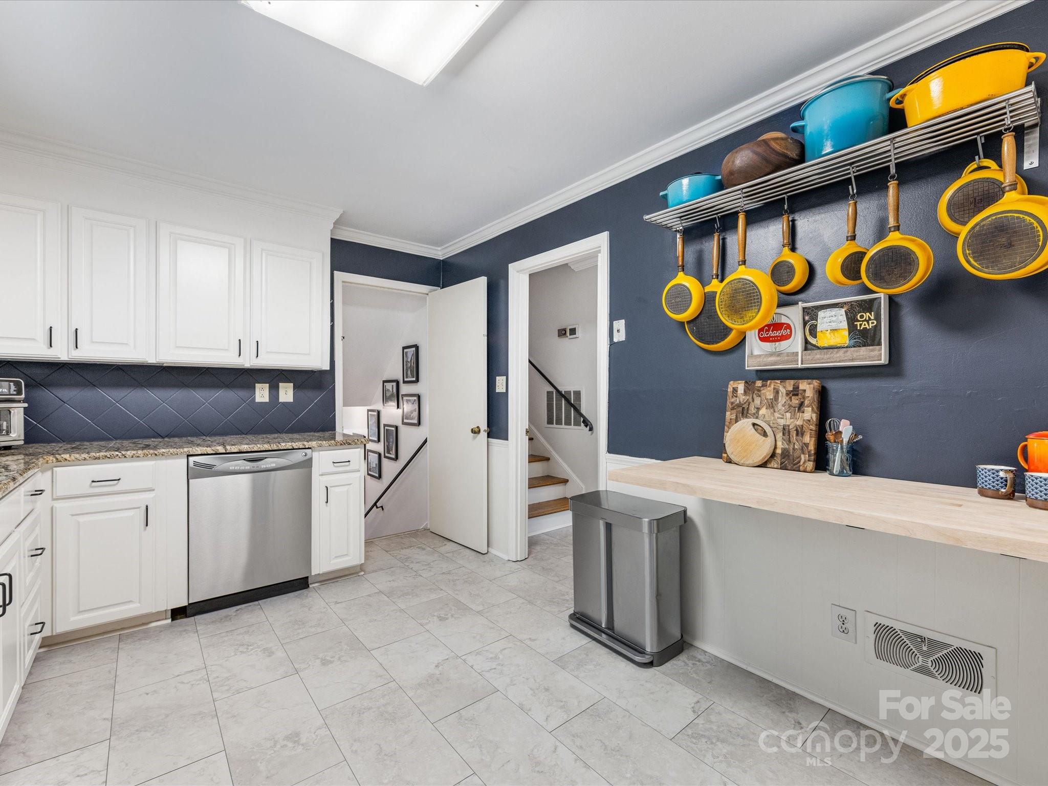 3200 Spring Valley Road Charlotte, NC 28210 - Photo 17 of 45 a kitchen with stainless steel appliances a refrigerator and a stove top oven