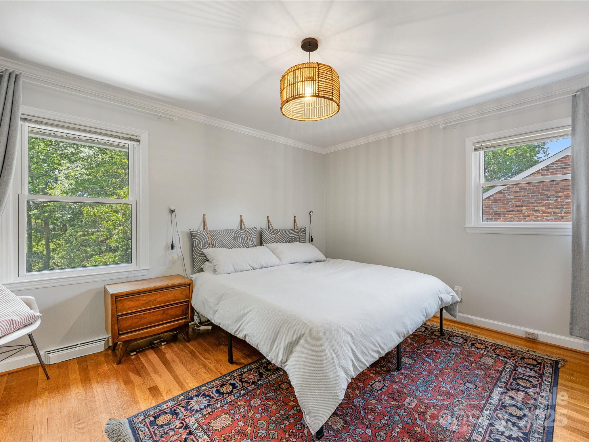 3200 Spring Valley Road Charlotte, NC 28210 - Photo 20 of 45 a bedroom with a bed and a window