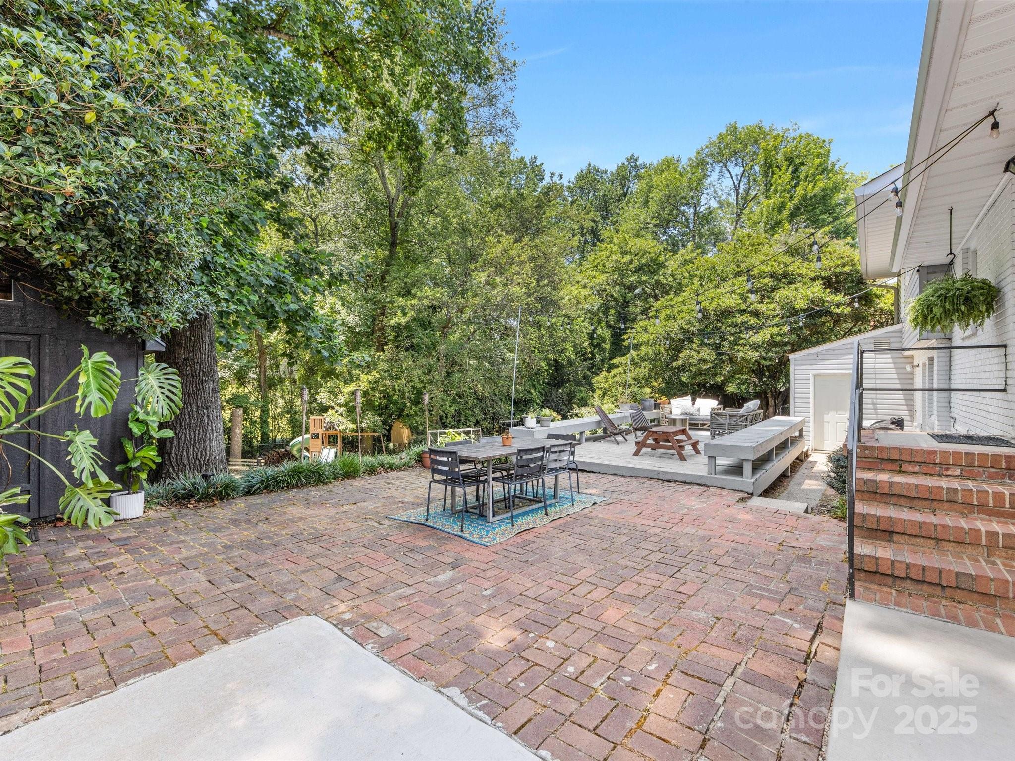 3200 Spring Valley Road Charlotte, NC 28210 - Photo 39 of 45 a view of a backyard with sitting area