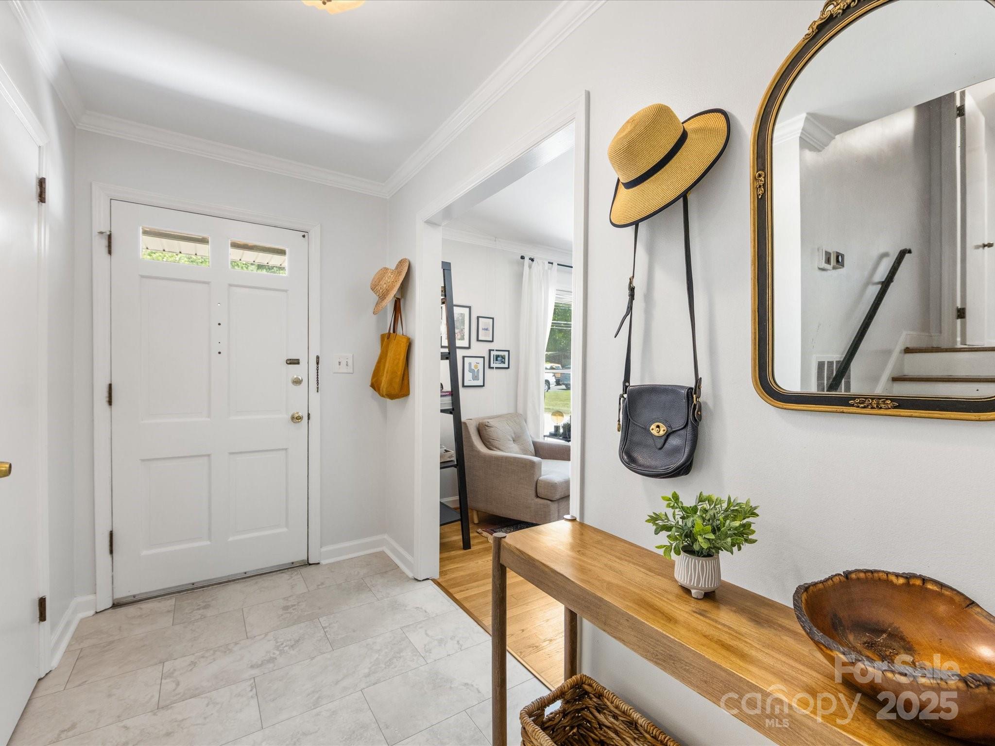 3200 Spring Valley Road Charlotte, NC 28210 - Photo 5 of 45 a living room with furniture and a mirror