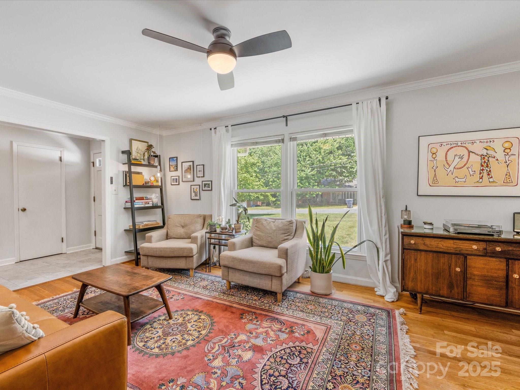 3200 Spring Valley Road Charlotte, NC 28210 - Photo 7 of 45 a living room with furniture and a large window