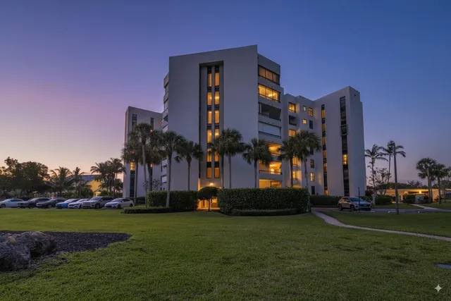 a front view of building with yard
