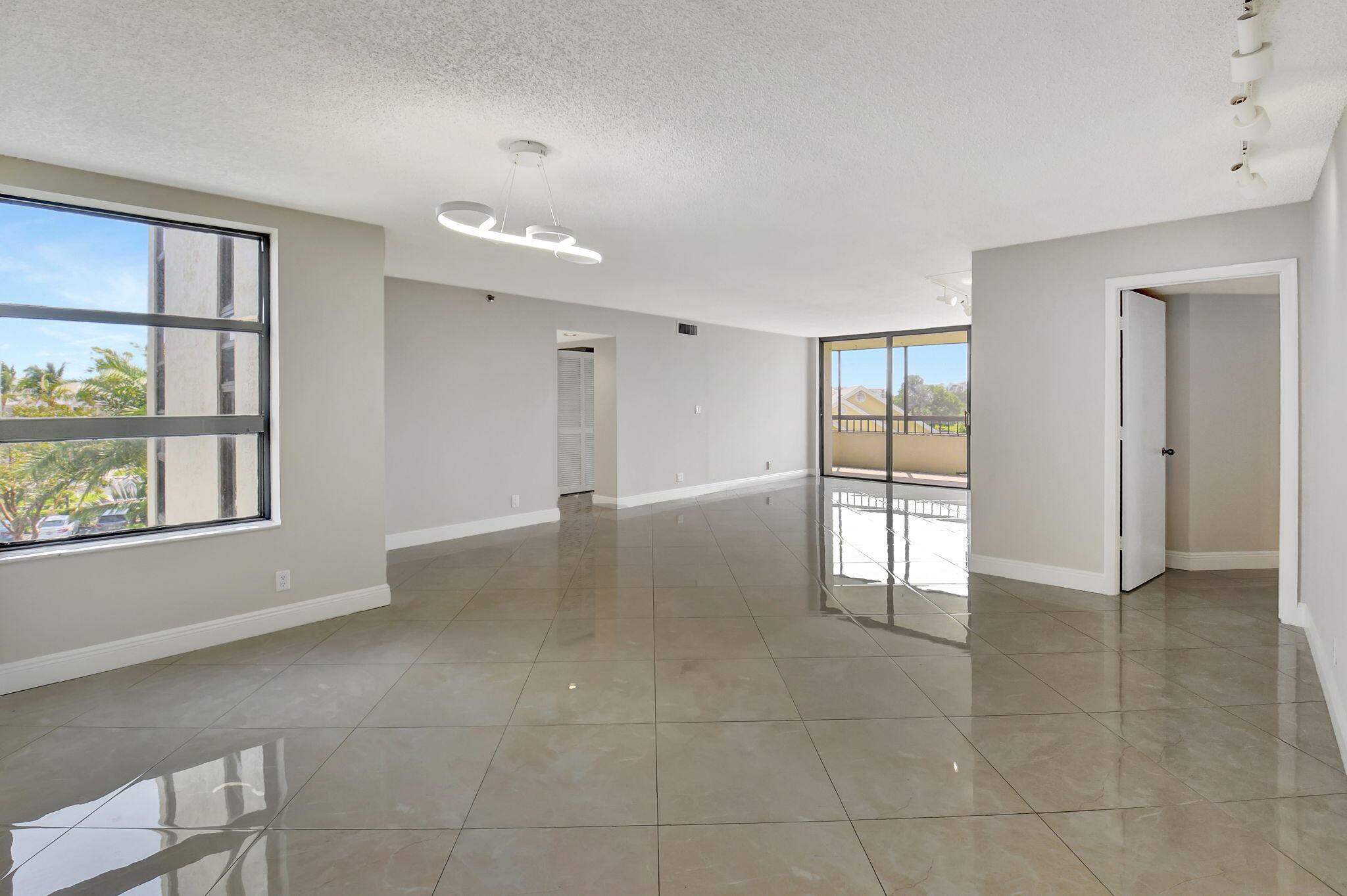 6372 La Costa Drive, Unit 302 Boca Raton, FL 33433 - Photo 16 of 52 a view of an empty room with a window