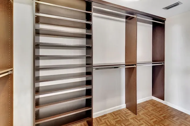 a bathroom with a double vanity sink and a bathtub