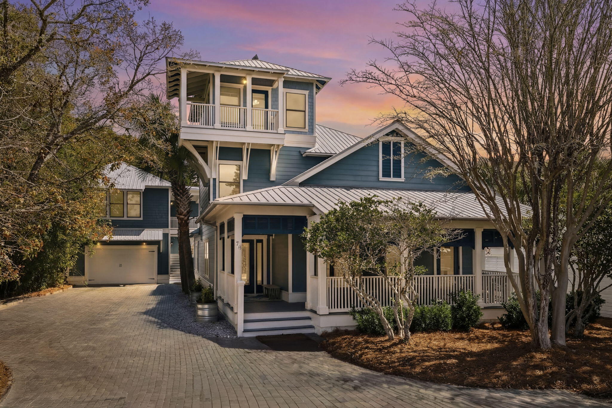 76 Crescent Road Santa Rosa Beach, FL 32459 - Photo 1 of 104 a front view of a house with garden