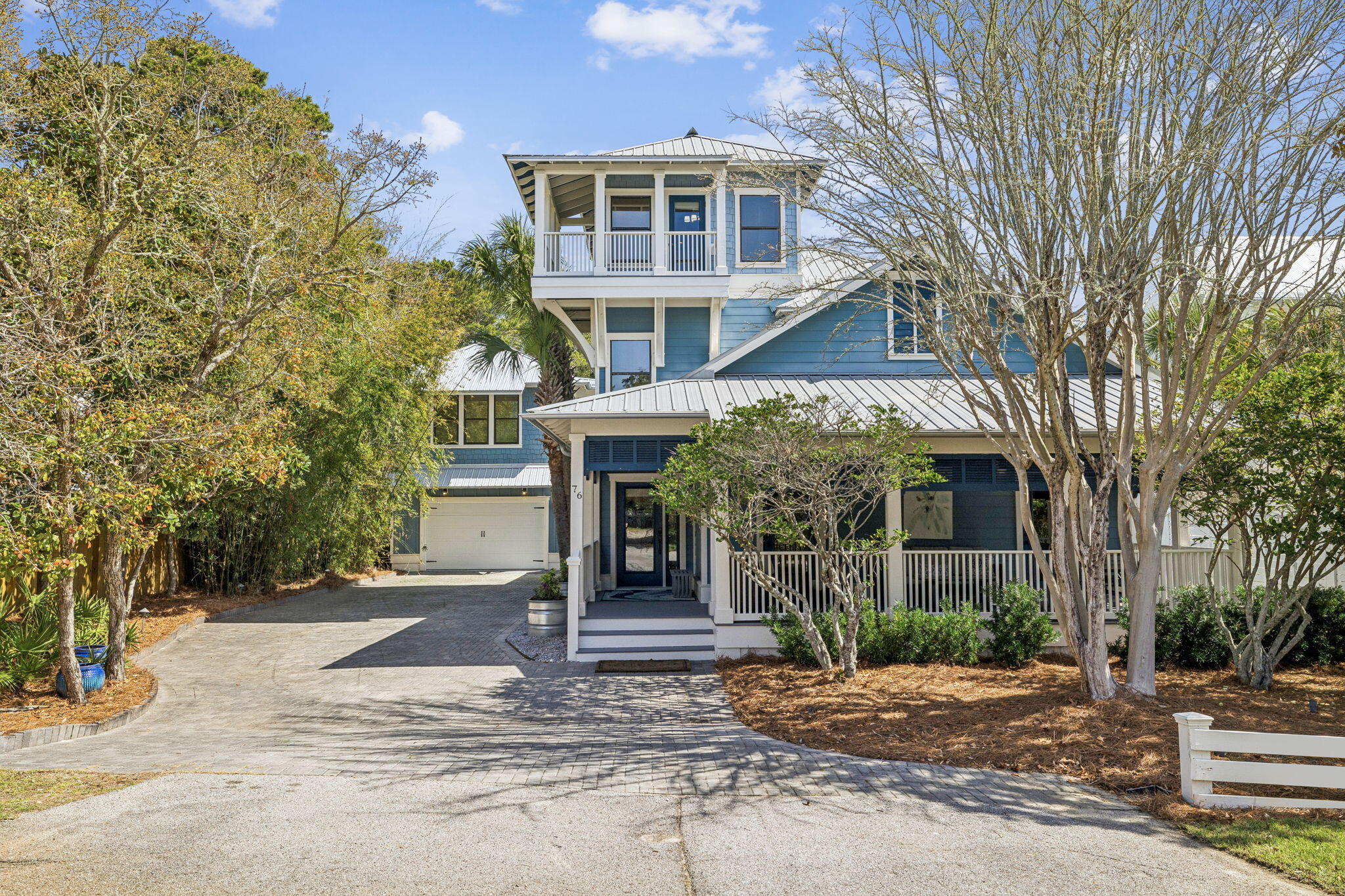 76 Crescent Road Santa Rosa Beach, FL 32459 - Photo 4 of 104 a front view of a house with a tree