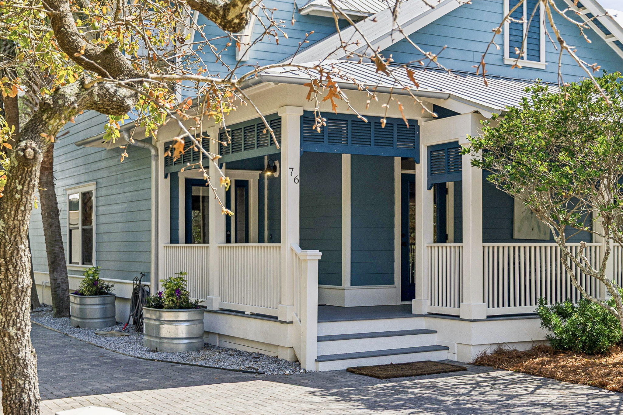 76 Crescent Road Santa Rosa Beach, FL 32459 - Photo 5 of 104 a front view of a house with a tree