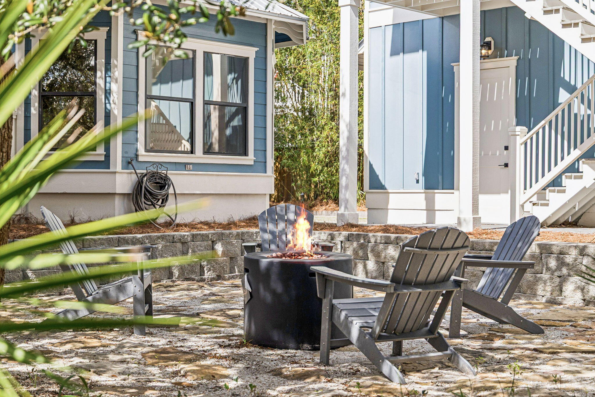 76 Crescent Road Santa Rosa Beach, FL 32459 - Photo 55 of 104 a view of an outdoor dining space with a table and chairs