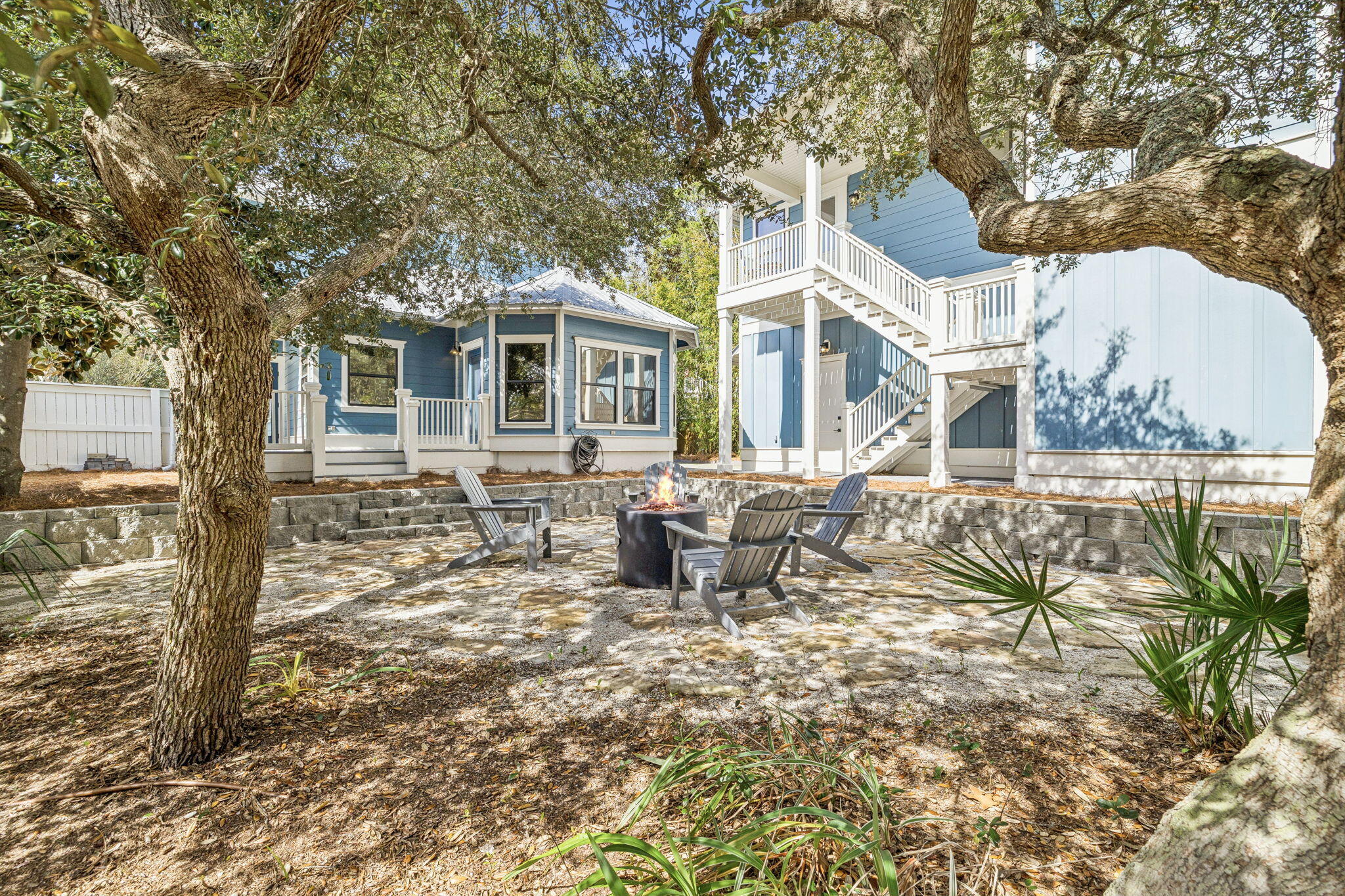 76 Crescent Road Santa Rosa Beach, FL 32459 - Photo 56 of 104 a view of a house with backyard porch and sitting area
