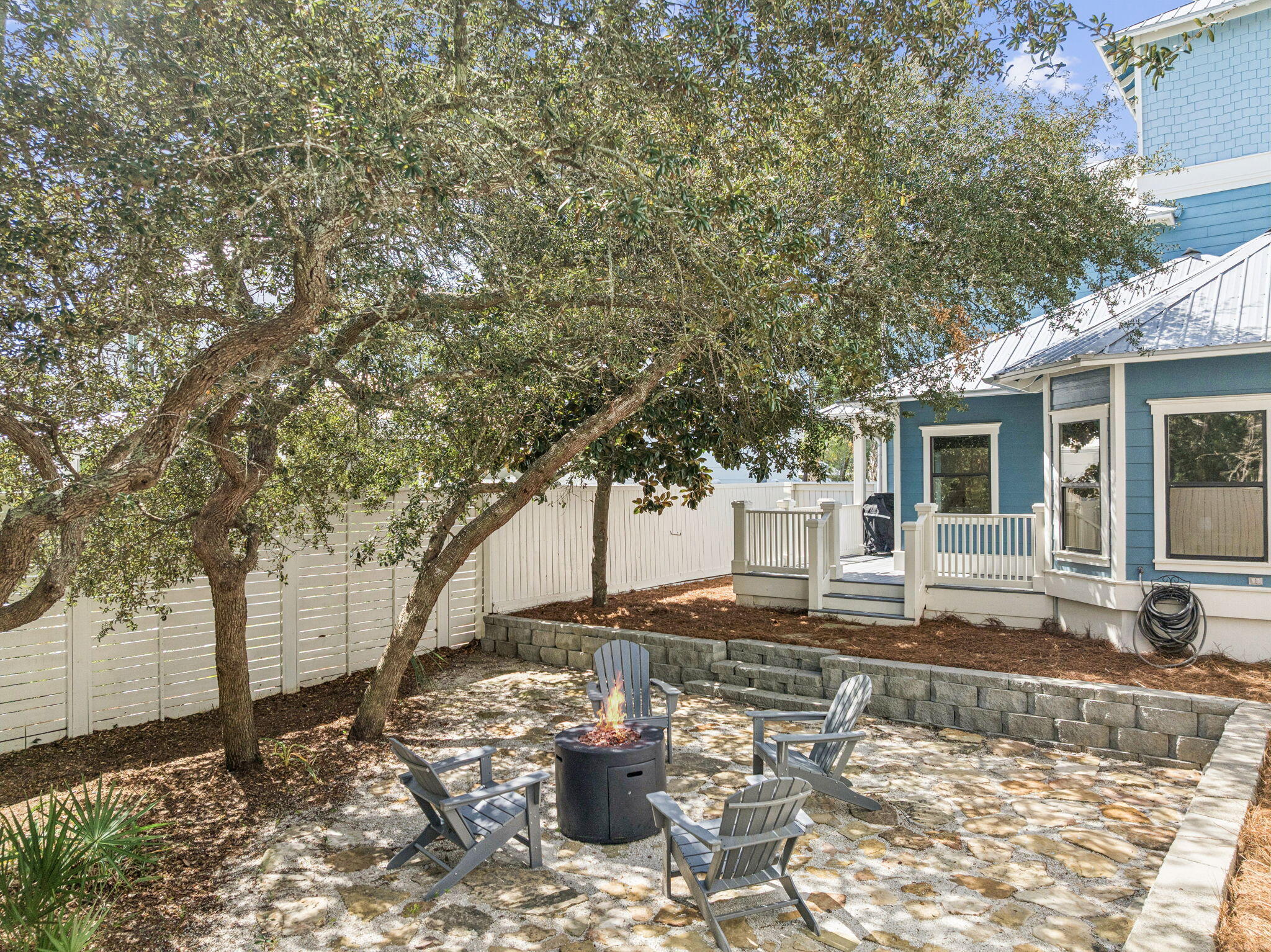 76 Crescent Road Santa Rosa Beach, FL 32459 - Photo 65 of 104 a view of a house with backyard and sitting area