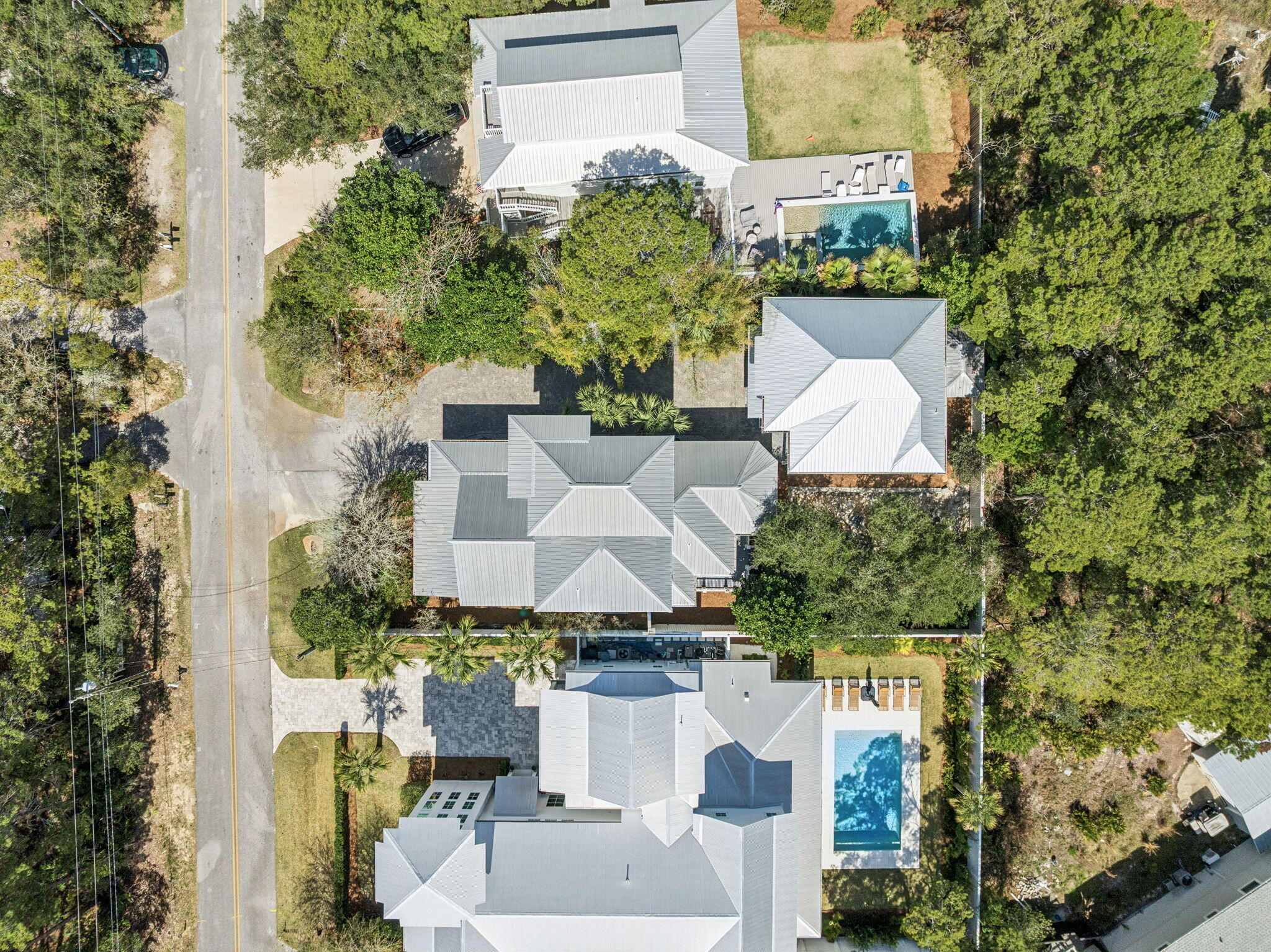 76 Crescent Road Santa Rosa Beach, FL 32459 - Photo 96 of 104 an aerial view of a house with a yard and lake view