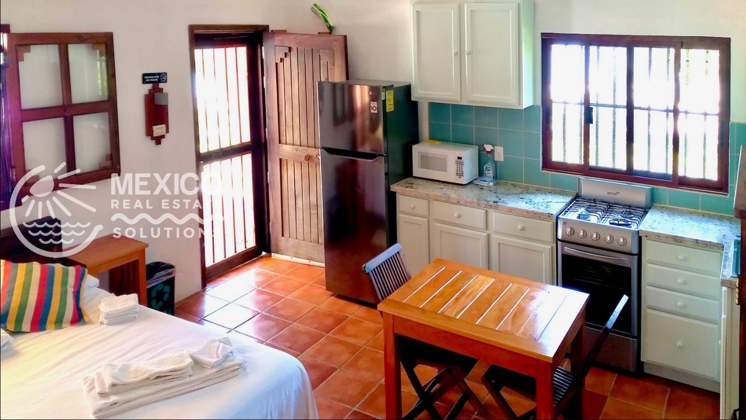 5 Camino Costera Dickinson, undefined 77539 - Photo 3 of 9 a kitchen with stainless steel appliances granite countertop a stove a refrigerator a sink and a cabinets