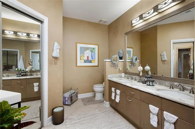 a bath tub sitting in a bathroom next to a window