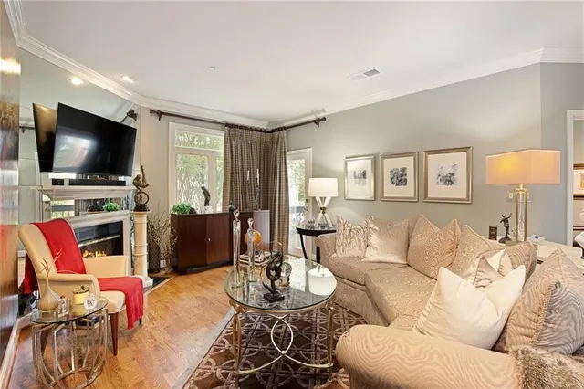 a kitchen with stainless steel appliances granite countertop a stove and a refrigerator
