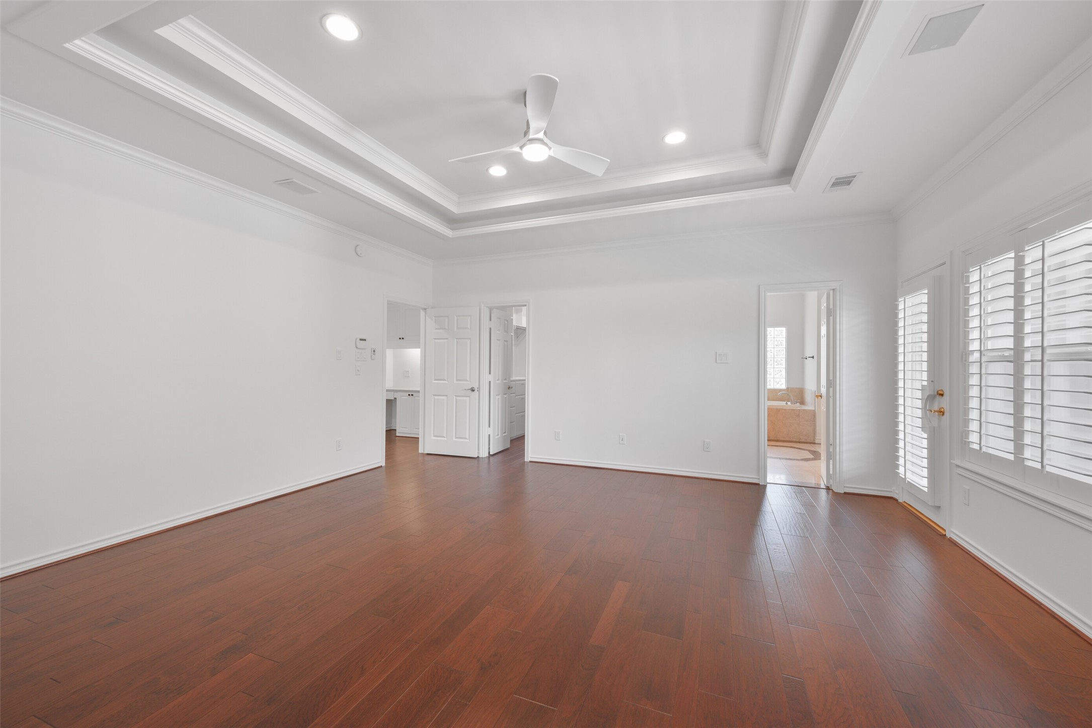 3724 Wroxton Road Houston, TX 77005 - Photo 28 of 40 Primary bedroom has two large walk-in closets, a bonus room, and a large, luxurious bathroom.