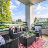 a view of roof deck with couches