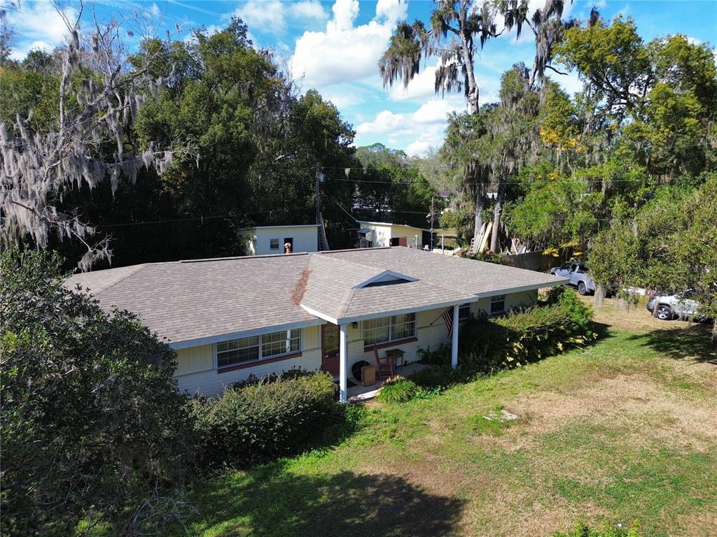 1324 Southeast 33rd Terrace Ocala, FL 34471 - Photo 2 of 6 an aerial view of a house with yard and trampoline