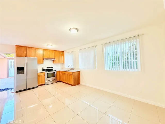a large living room with a large window