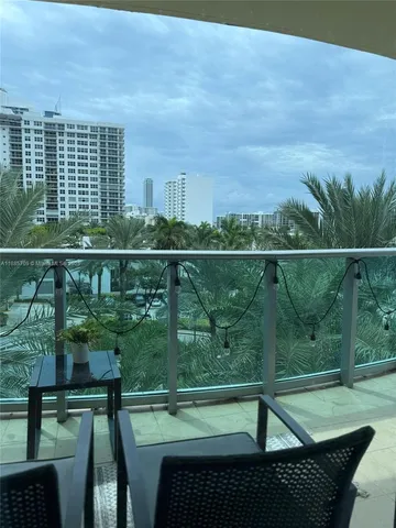 a view of a balcony with an outdoor space