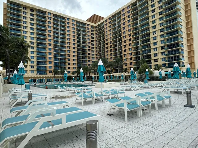 a picture of table and chairs and couches in the patio