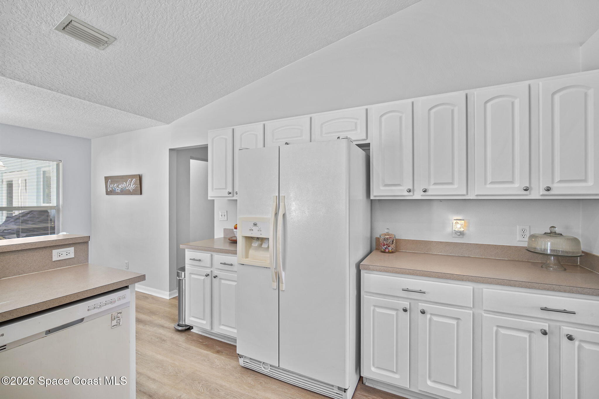 211 East Crisafulli Road, Unit NORTH Merritt Island, FL 32953 - Photo 16 of 33 11-web-or-mls-CRISAFULLI_KITCHEN3