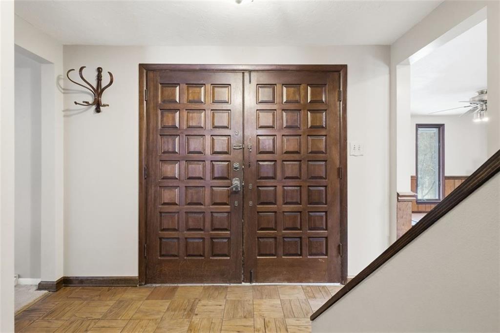 21 West Hillcrest Road Eighty Four, PA 15330 - Photo 11 of 45 a view of front door with stairs