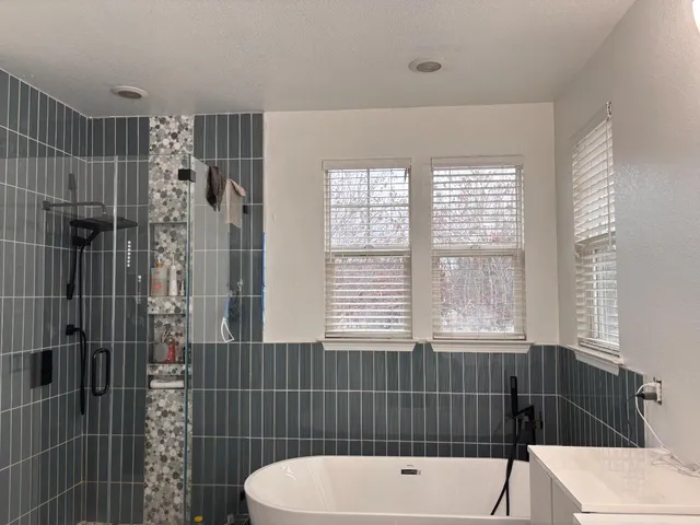a view of a house with a yard porch and sitting area