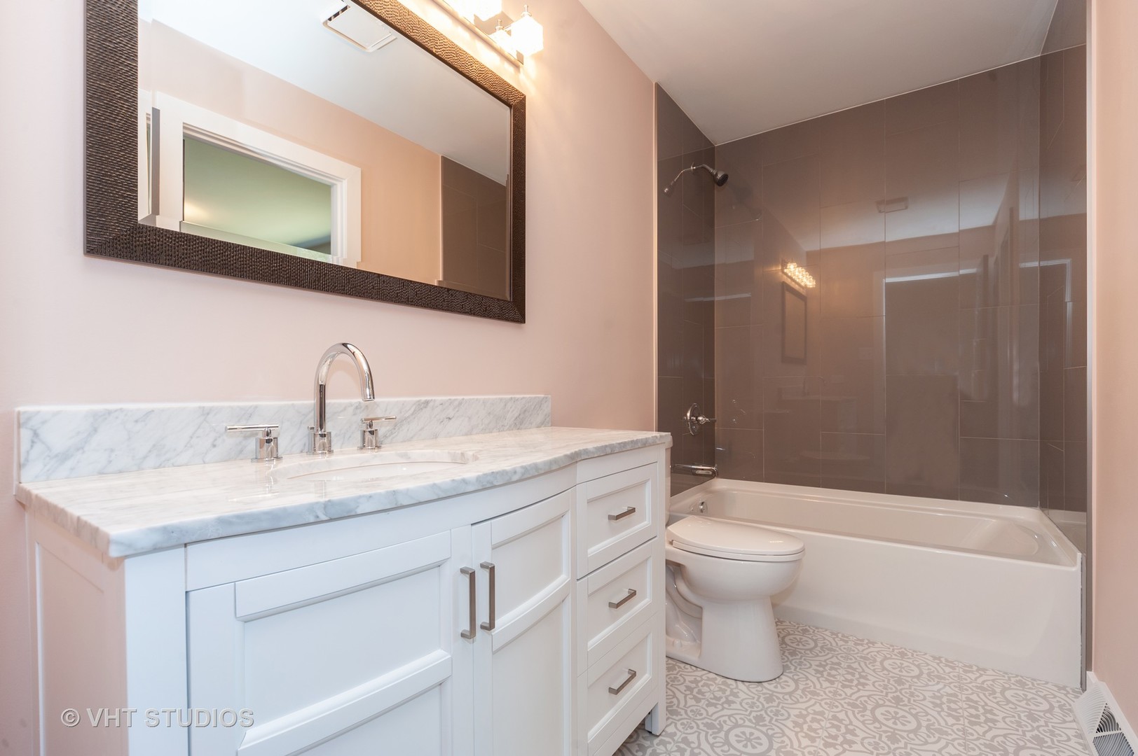 608 Willow Road Matteson, IL 60443 - Photo 11 of 15 a bathroom with a granite countertop sink toilet and shower