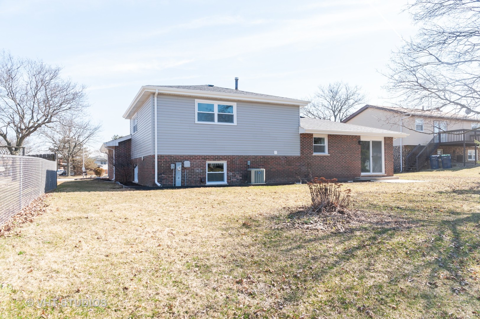608 Willow Road Matteson, IL 60443 - Photo 15 of 15 a front view of a house with a yard covered in snow