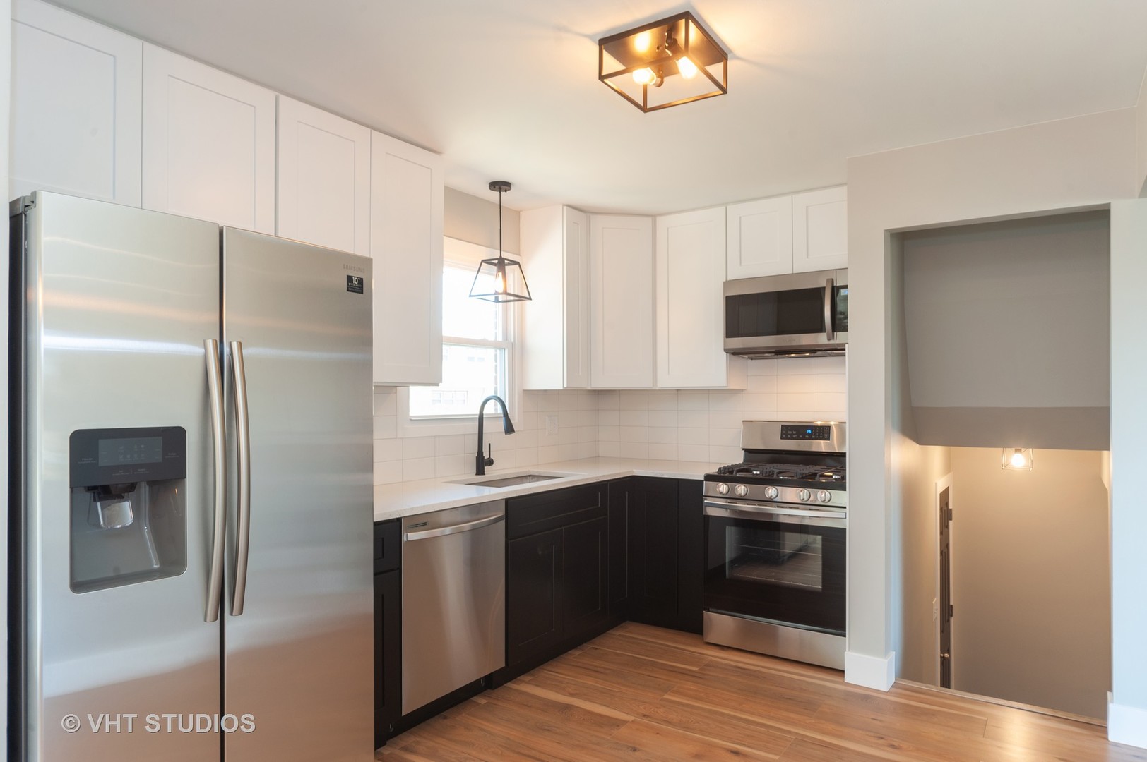 608 Willow Road Matteson, IL 60443 - Photo 4 of 15 a kitchen with stainless steel appliances a refrigerator stove and sink