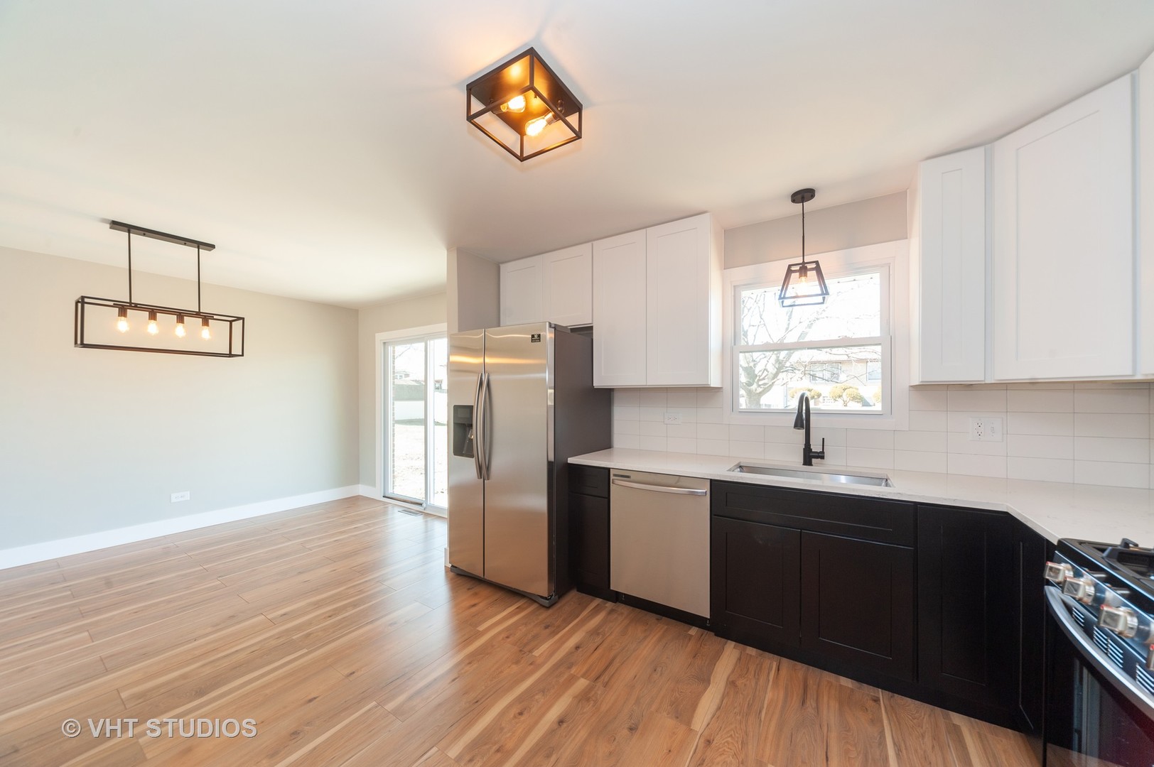 608 Willow Road Matteson, IL 60443 - Photo 7 of 15 a kitchen with a refrigerator and a sink
