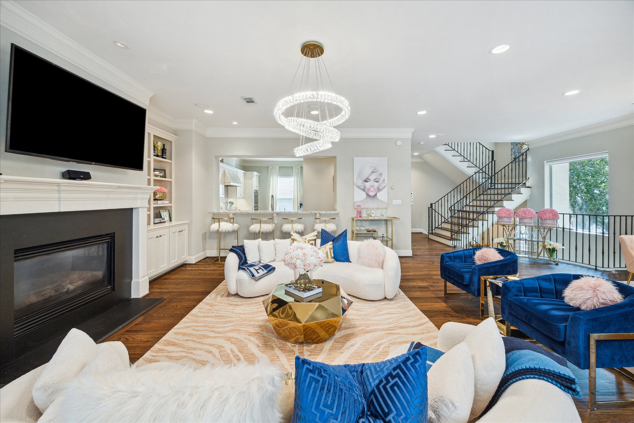 4724 Banning Drive, Unit A Houston, TX 77027 - Photo 14 of 34 A grand gas fireplace enhances the ambiance, while stunning treetop views can be enjoyed from every window.