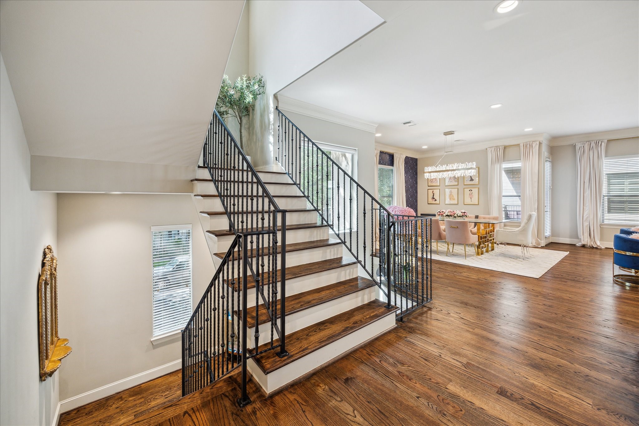 4724 Banning Drive, Unit A Houston, TX 77027 - Photo 23 of 34 The second-floor landing features a grand, elegant staircase that ascends to the serene master retreat on the third floor.