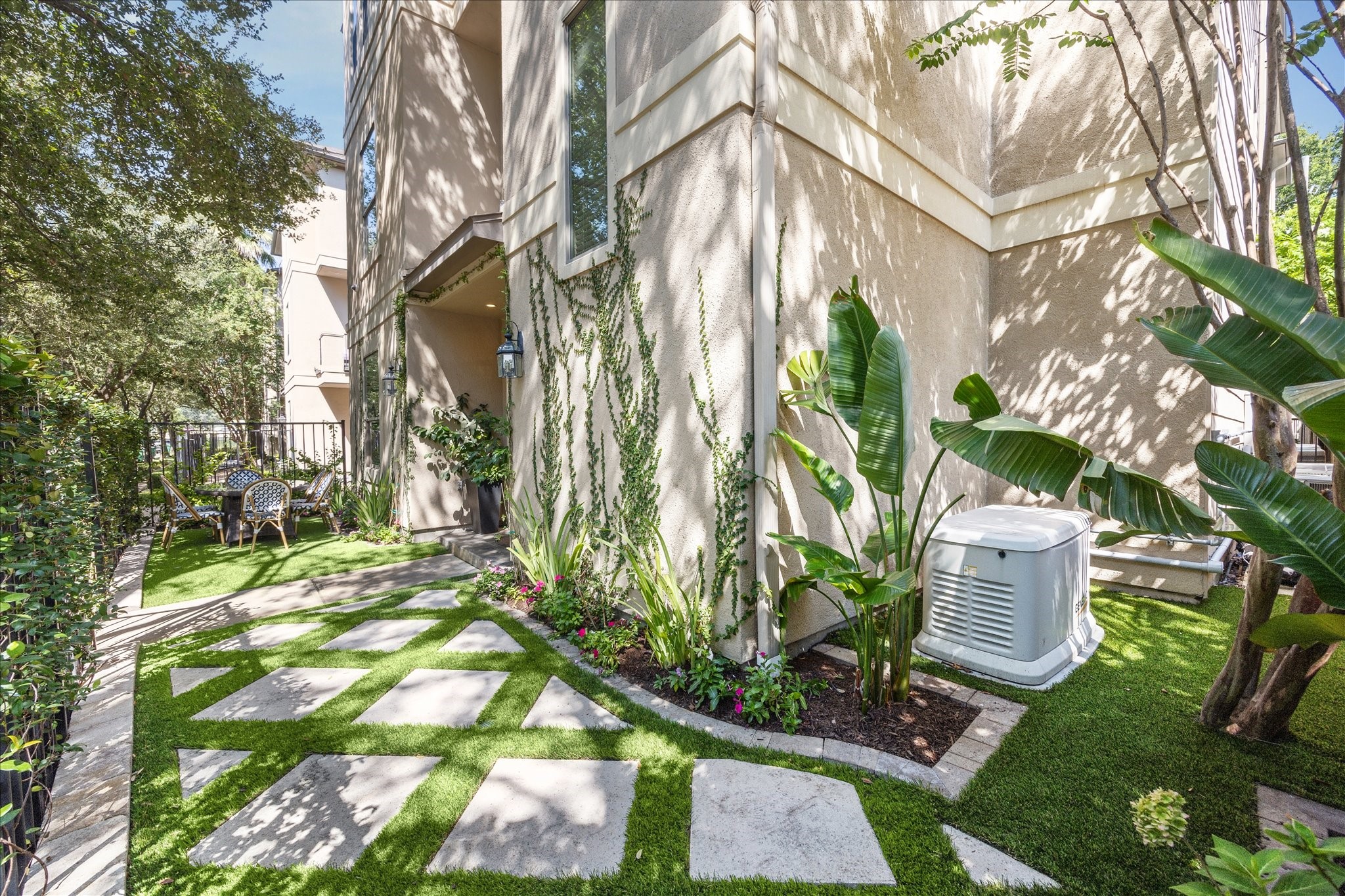 4724 Banning Drive, Unit A Houston, TX 77027 - Photo 4 of 34 Featuring striking landscaping with lush turf and new pavers, this property also includes a whole-home generator for added comfort and peace of mind. 5 year warranty included with the sale.