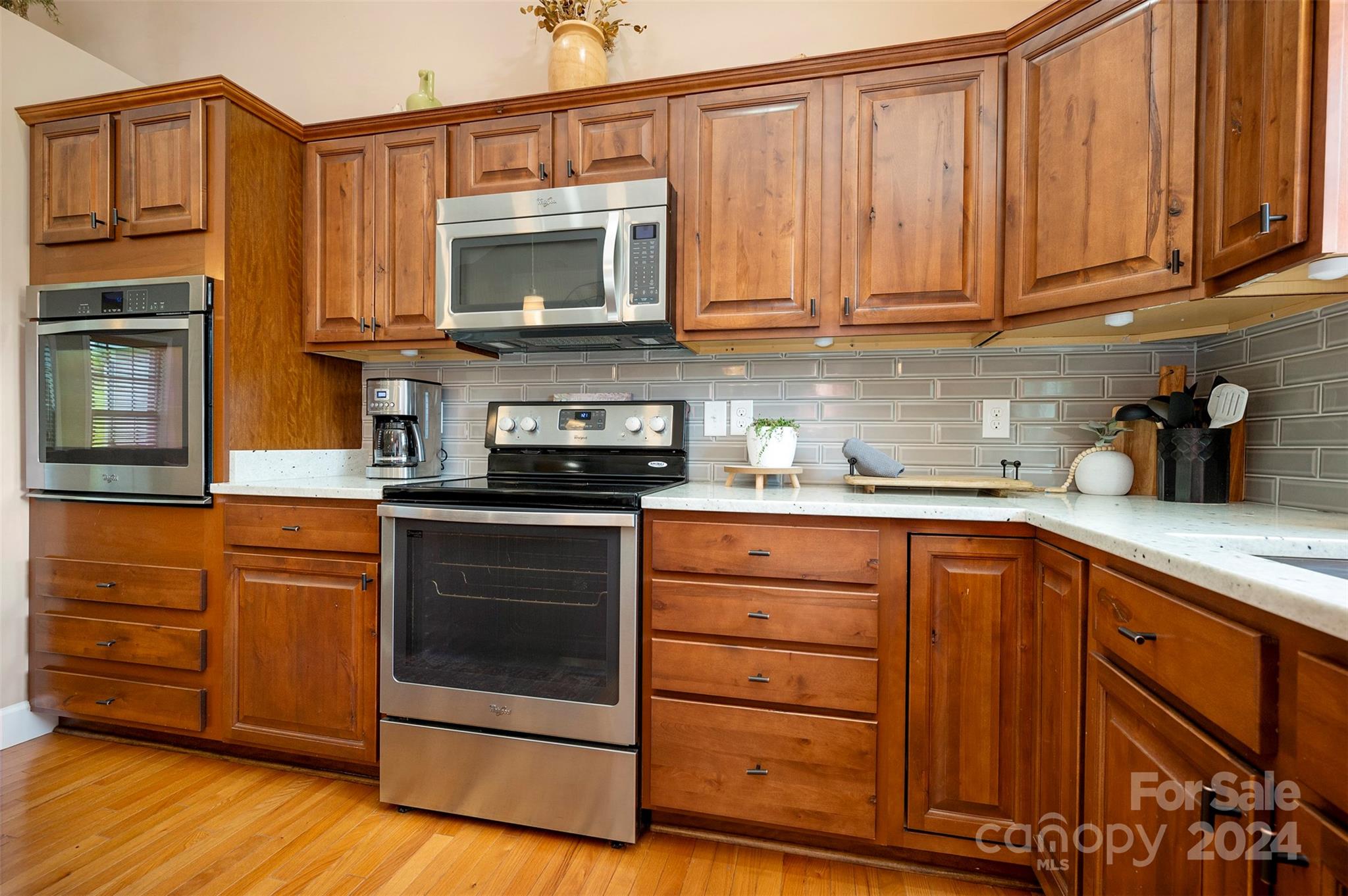 210 Thompson Road Rutherfordton, NC 28139 - Photo 11 of 44 a kitchen with stainless steel appliances granite countertop a stove microwave and cabinets
