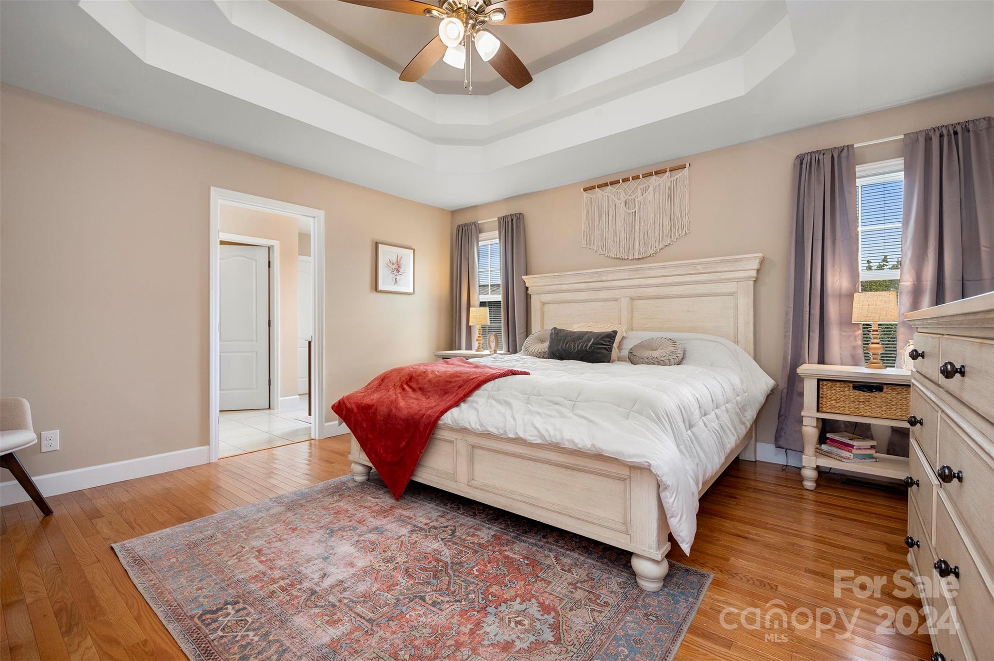 210 Thompson Road Rutherfordton, NC 28139 - Photo 14 of 44 a bedroom with a bed and wooden floor