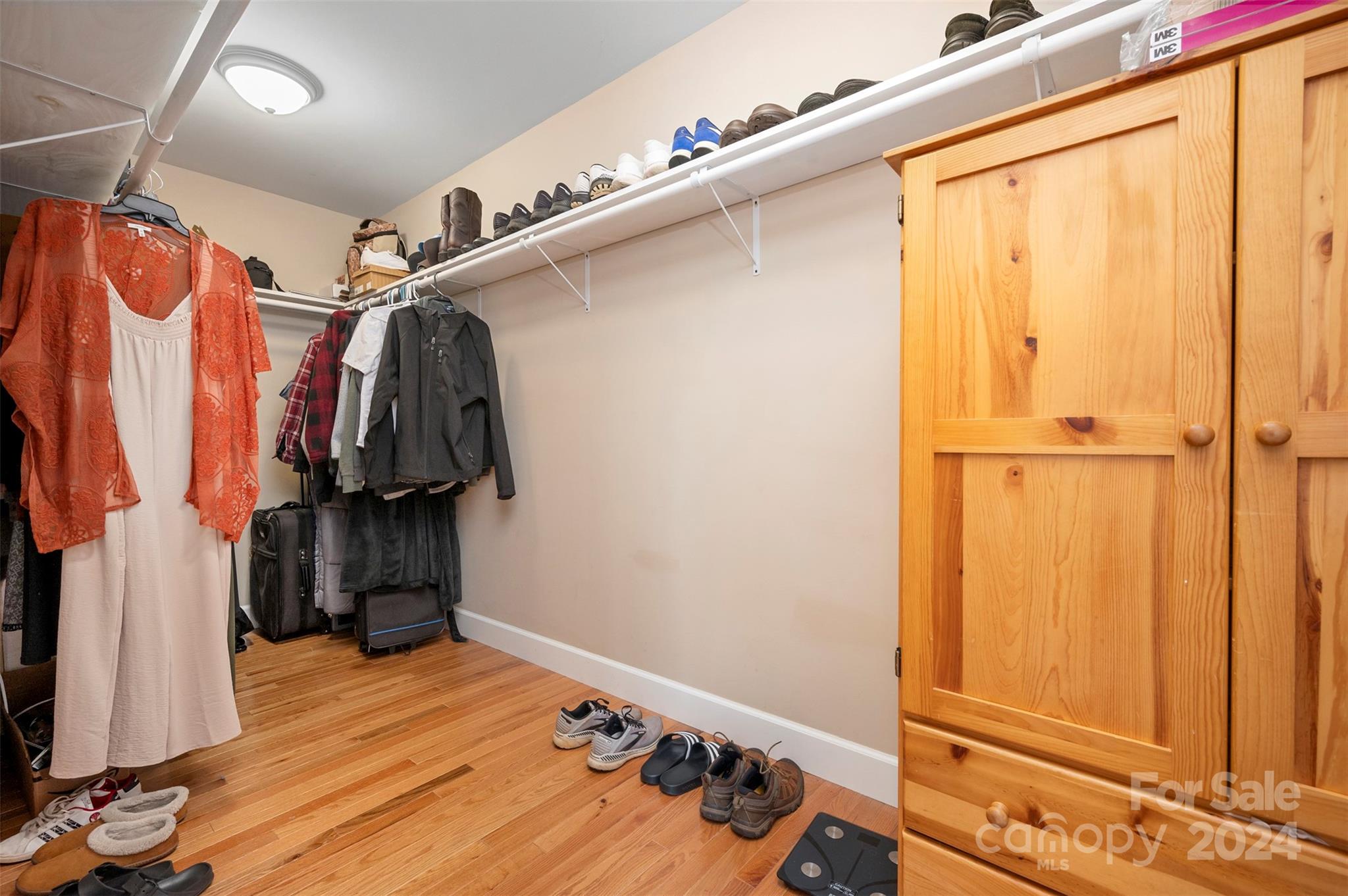 210 Thompson Road Rutherfordton, NC 28139 - Photo 19 of 44 a view of walk in closet with clothes and shoes