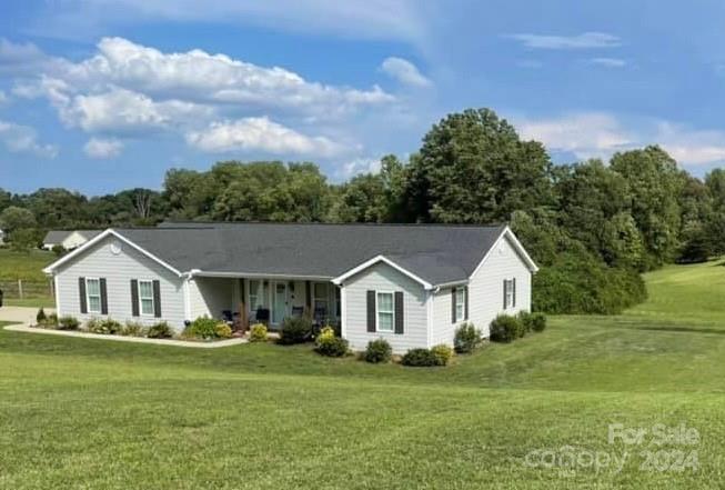 210 Thompson Road Rutherfordton, NC 28139 - Photo 2 of 44 a view of house that has garden
